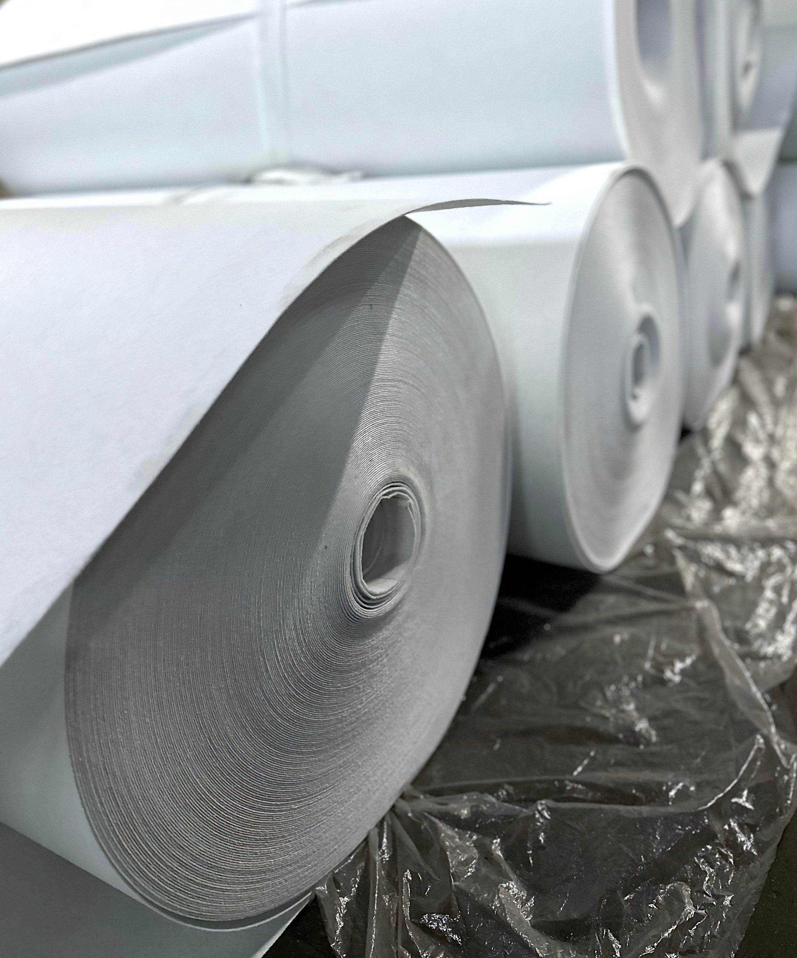 Rolled geotextile material